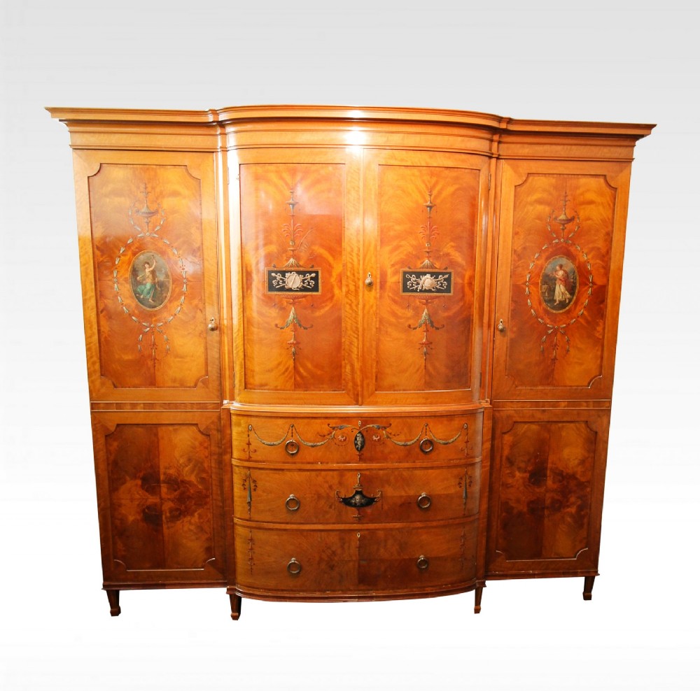 A SATINWOOD PAINTED WARDROBE BY MAPLE AND CO