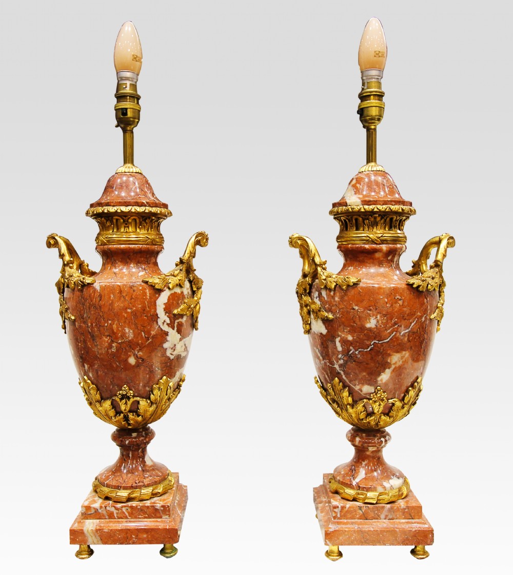 A PAIR OF FRENCH MARBLE & ORMOLU LAMPS OF URN FORM 