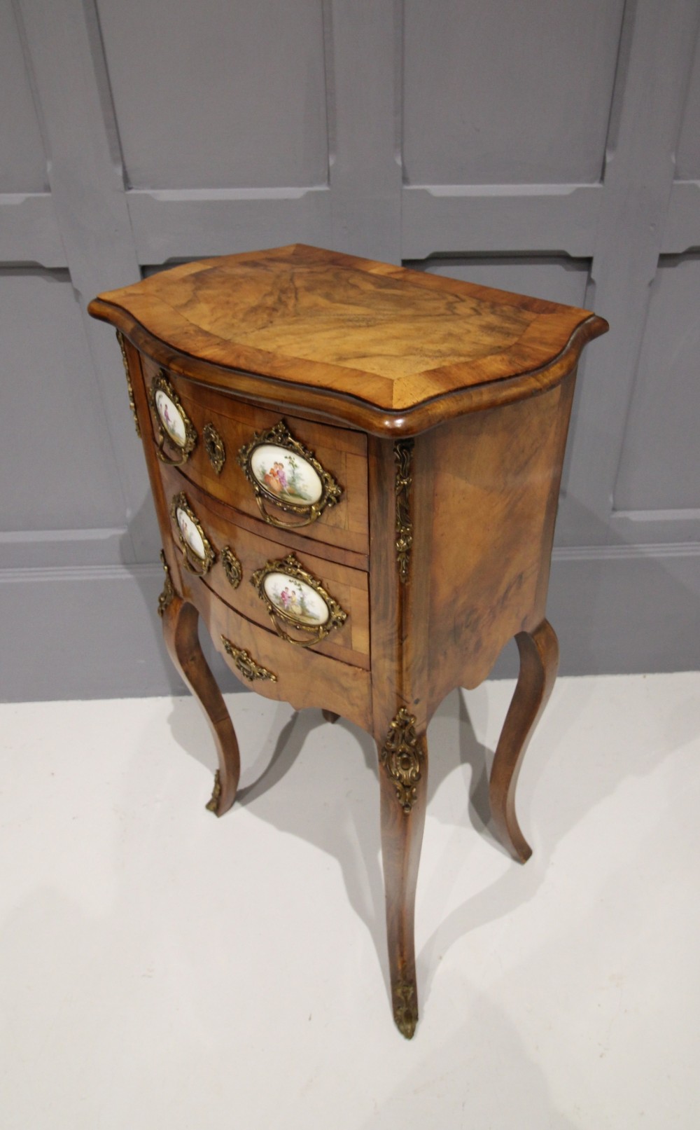 CONTINENTAL WALNUT CHEST WITH PLAQUES 