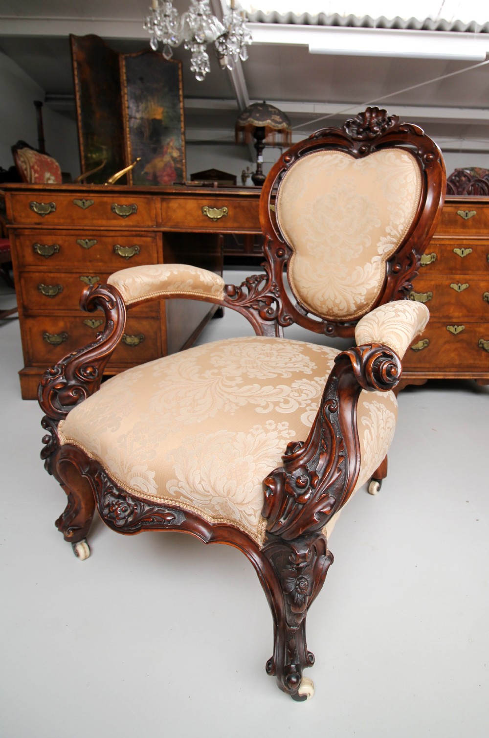A BEAUTIFUL VICTORIAN CARVED WALNUT ARMCHAIR