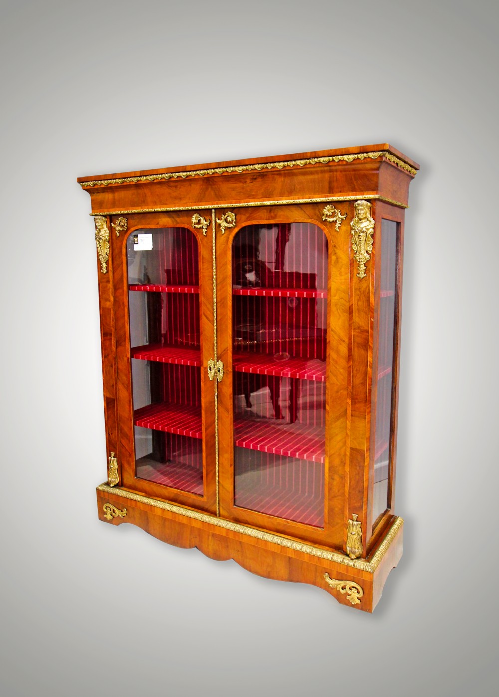A FRENCH KINGWOOD & WALNUT ORMOLU MOUNTED DISPLAY CABINET
