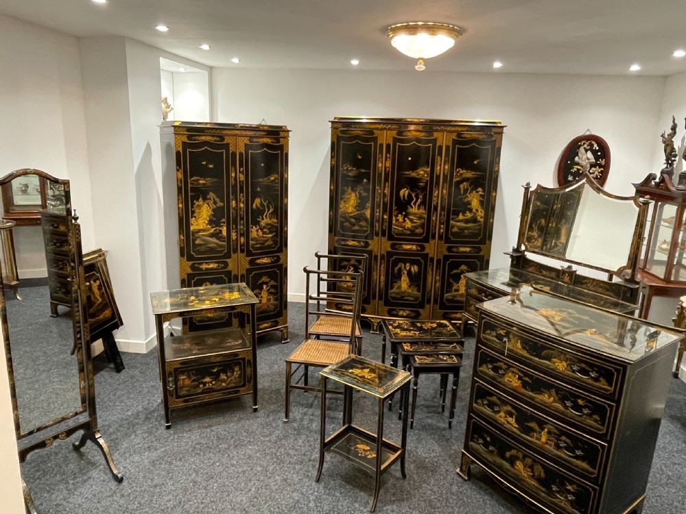 A stunning 11 piece black lacquered chinoiserie bedroom suite  View II