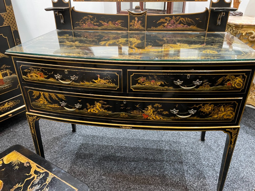 A stunning 11 piece black lacquered chinoiserie bedroom suite  View IX