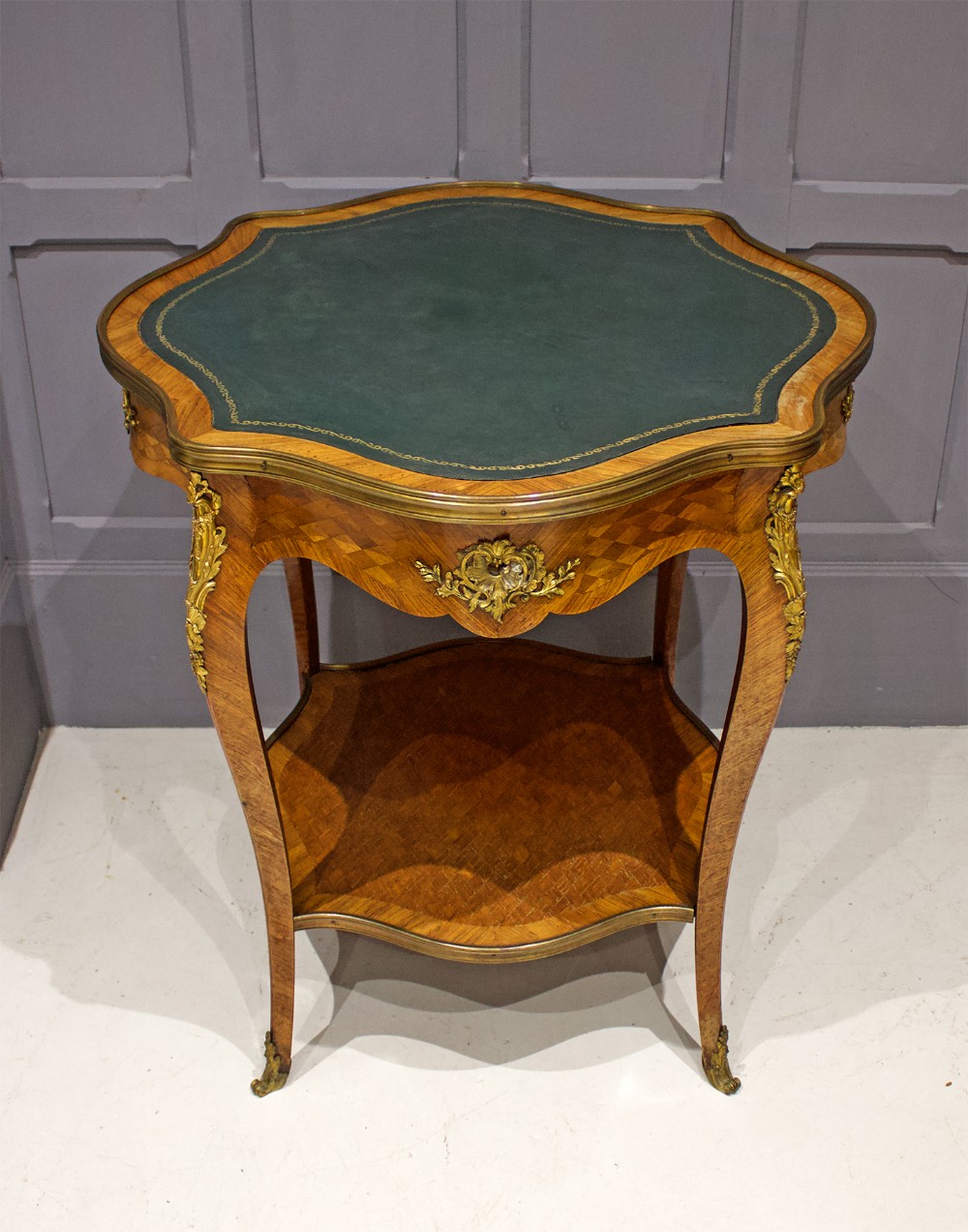 19TH CENTURY FRENCH ORMOLU MOUNTED SIDE TABLE WITH LEATHER TOP