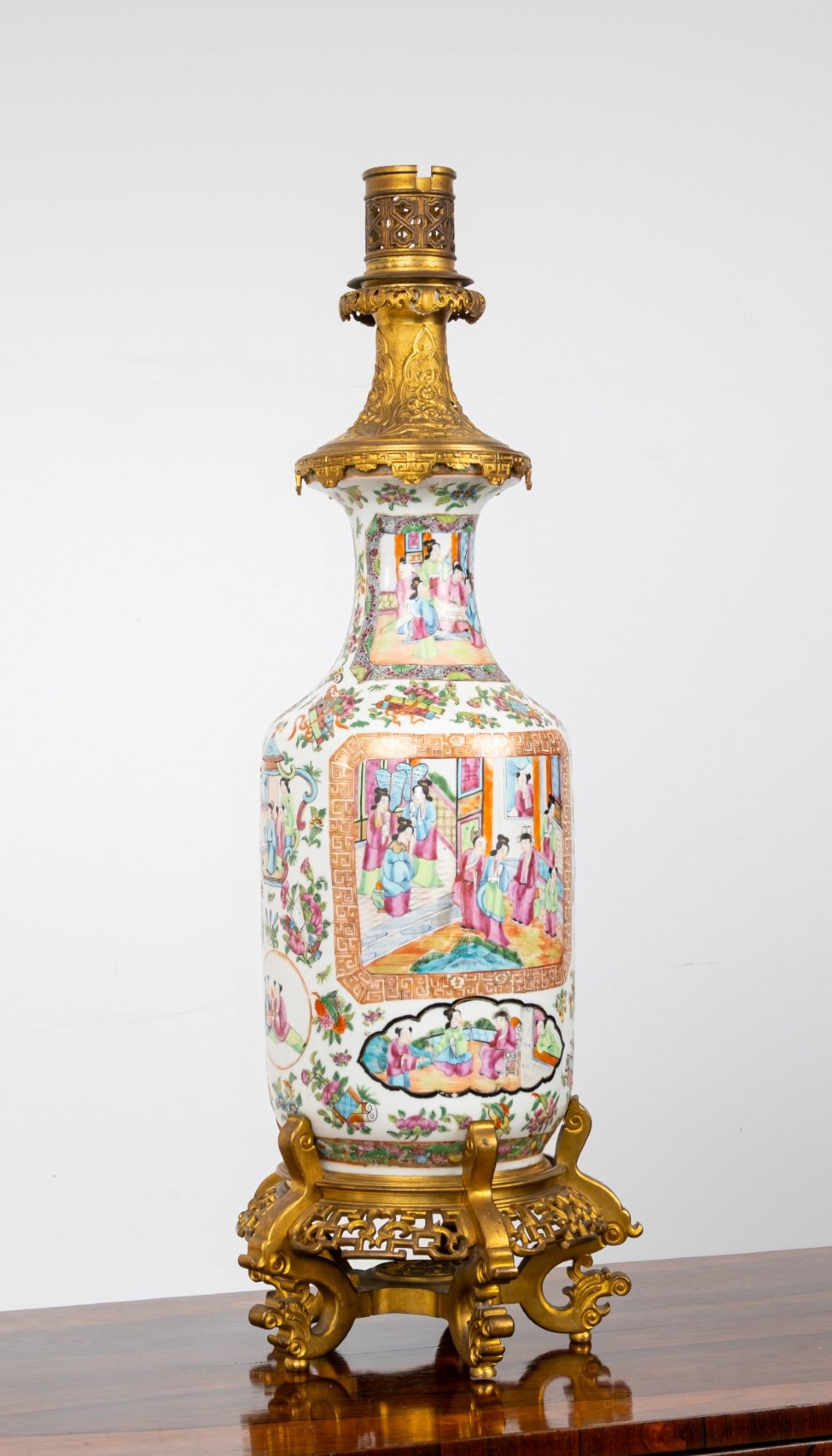 A nineteenth-century Rose Medallion porcelain vase mounted as a table lamp with an ornate gilt bronze base and collar. View III