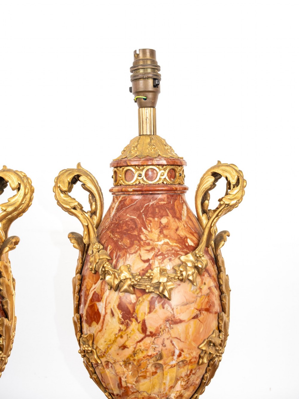 A pair of late nineteenth-century French urn-form table lamps crafted from veined red marble with gilt bronze scroll handles and floral garlands. View VII