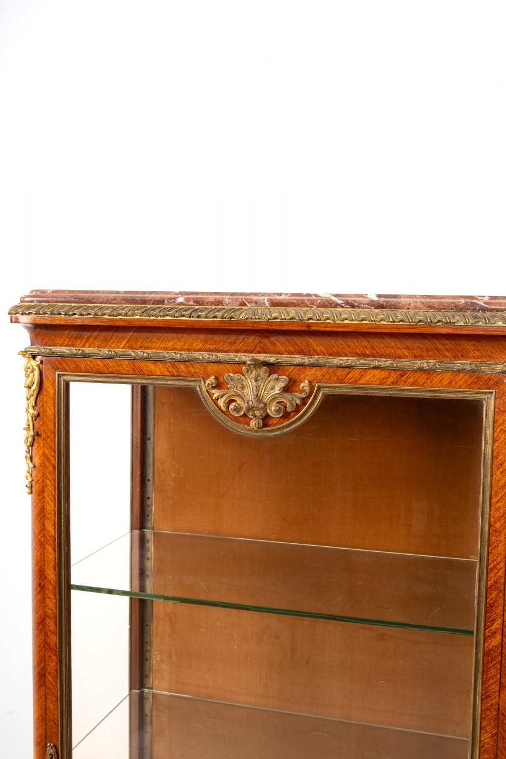 Pair of late 19th-century French kingwood vitrine cabinets featuring marble tops, glass display sections, hand-painted lower panels, and decorative gilt bronze mounts. View IX