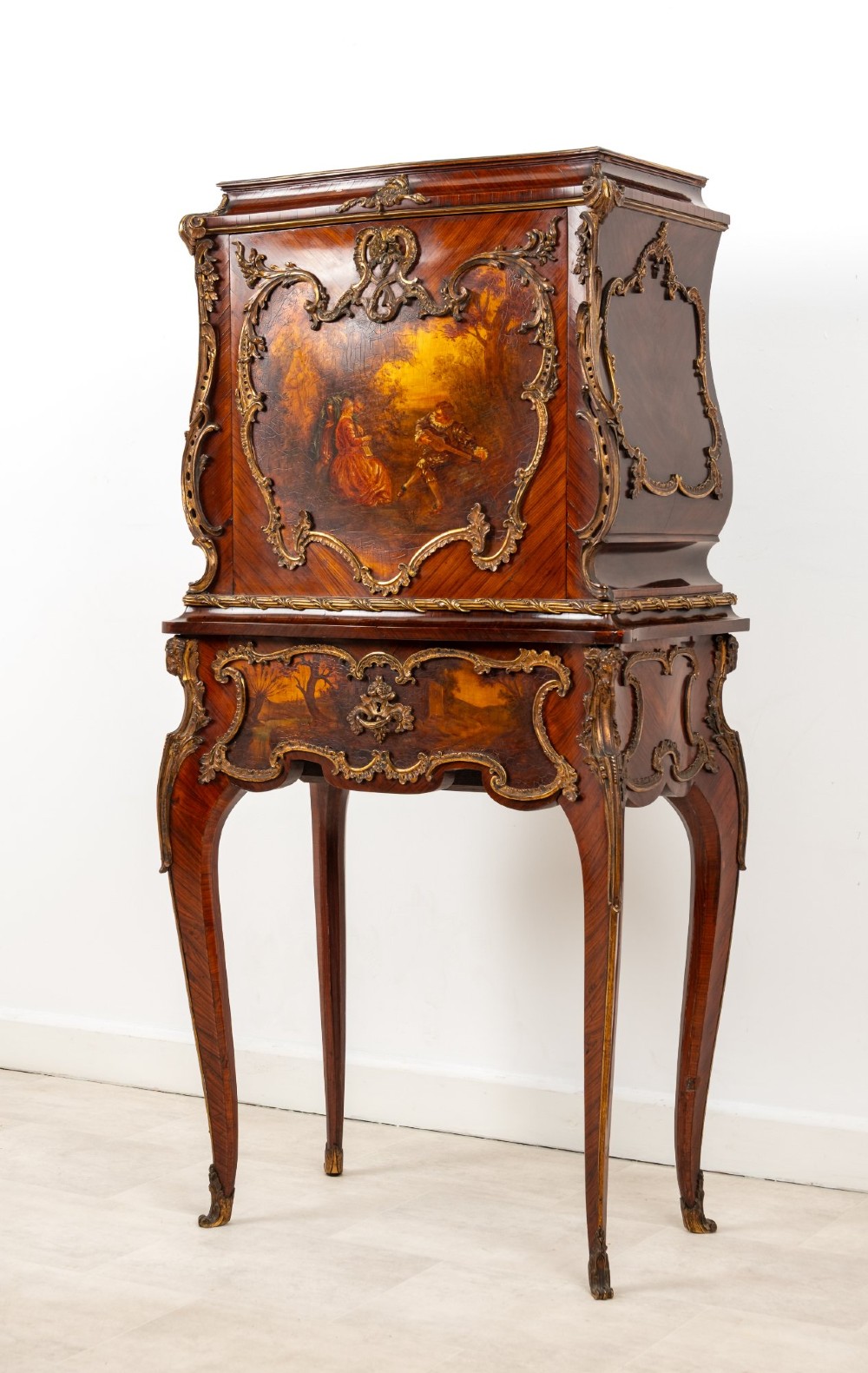 A French Louis XV style kingwood secretaire a abattant on cabriole legs, decorated with gilt bronze mounts and a hand-painted Vernis Martin scene on the fall-front flap. View III