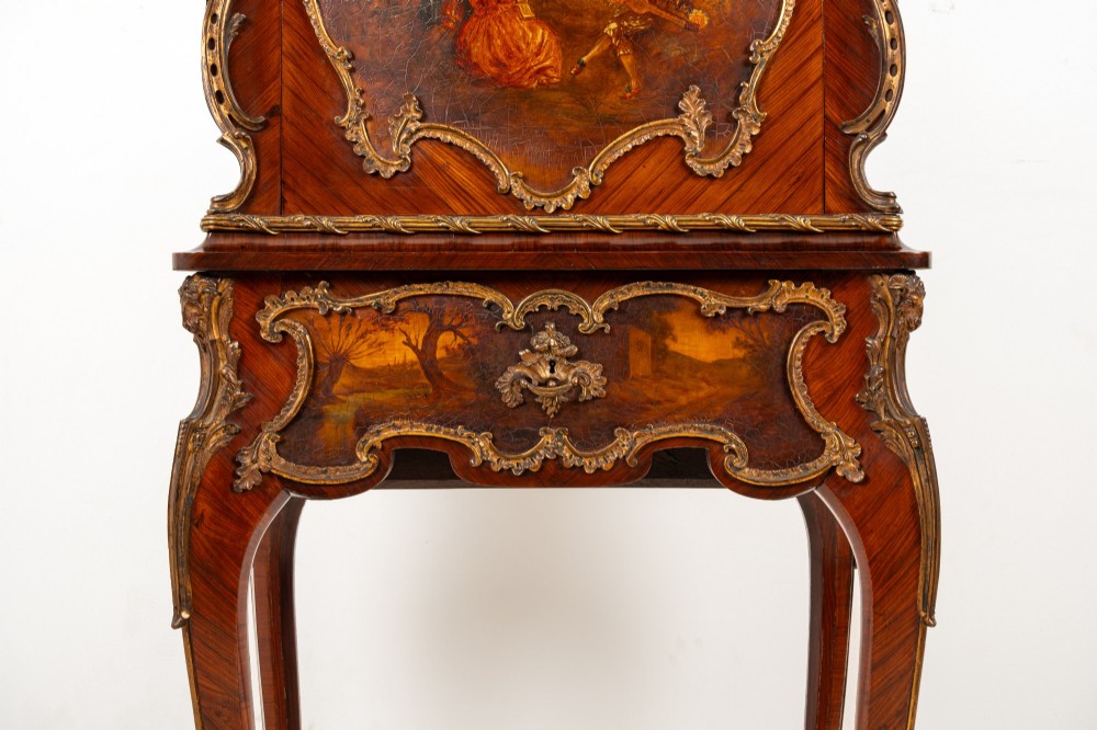 A French Louis XV style kingwood secretaire a abattant on cabriole legs, decorated with gilt bronze mounts and a hand-painted Vernis Martin scene on the fall-front flap. View V