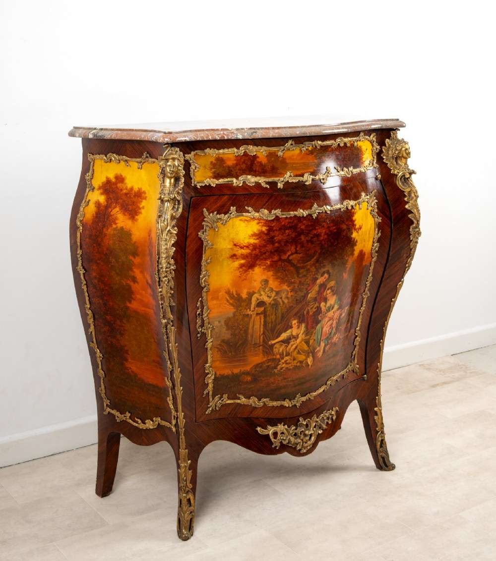 An antique French Vernis Martin bombe cabinet featuring hand-painted pastoral scenes on a curved door, ornate gilt-bronze mounts, and a marble top. View IV