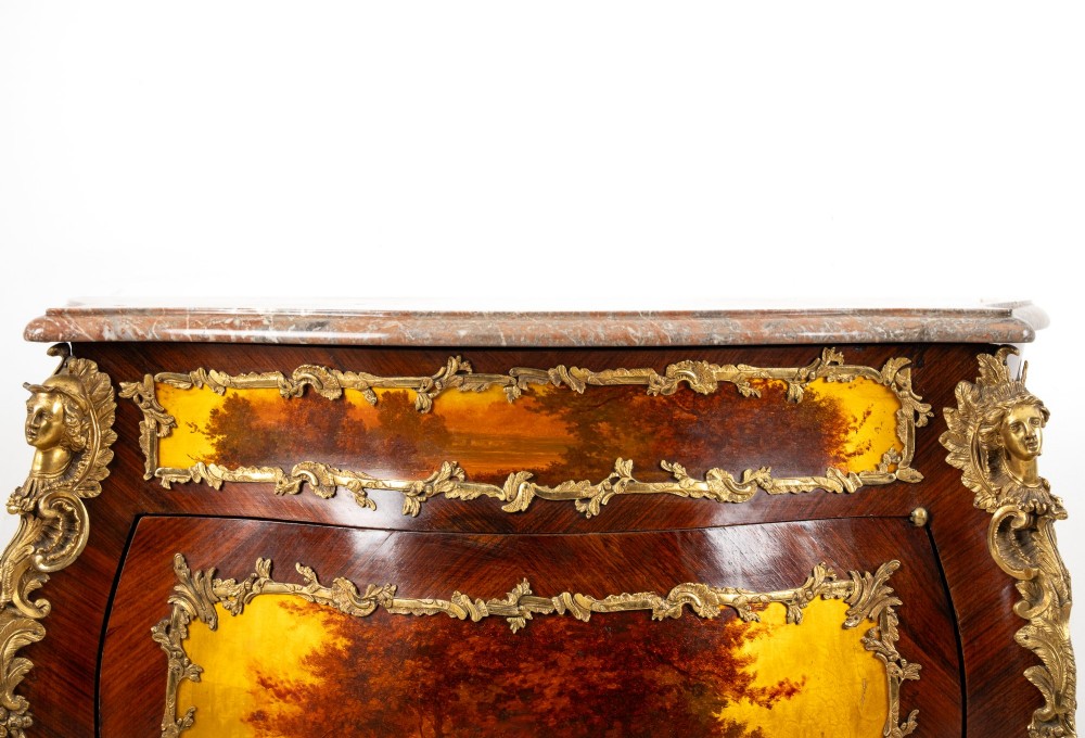 An antique French Vernis Martin bombe cabinet featuring hand-painted pastoral scenes on a curved door, ornate gilt-bronze mounts, and a marble top. View VII