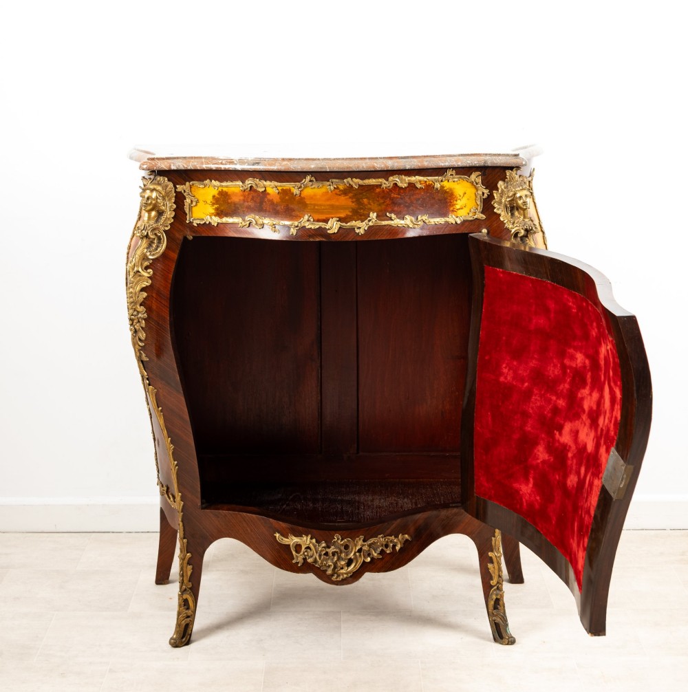 An antique French Vernis Martin bombe cabinet featuring hand-painted pastoral scenes on a curved door, ornate gilt-bronze mounts, and a marble top. View XI