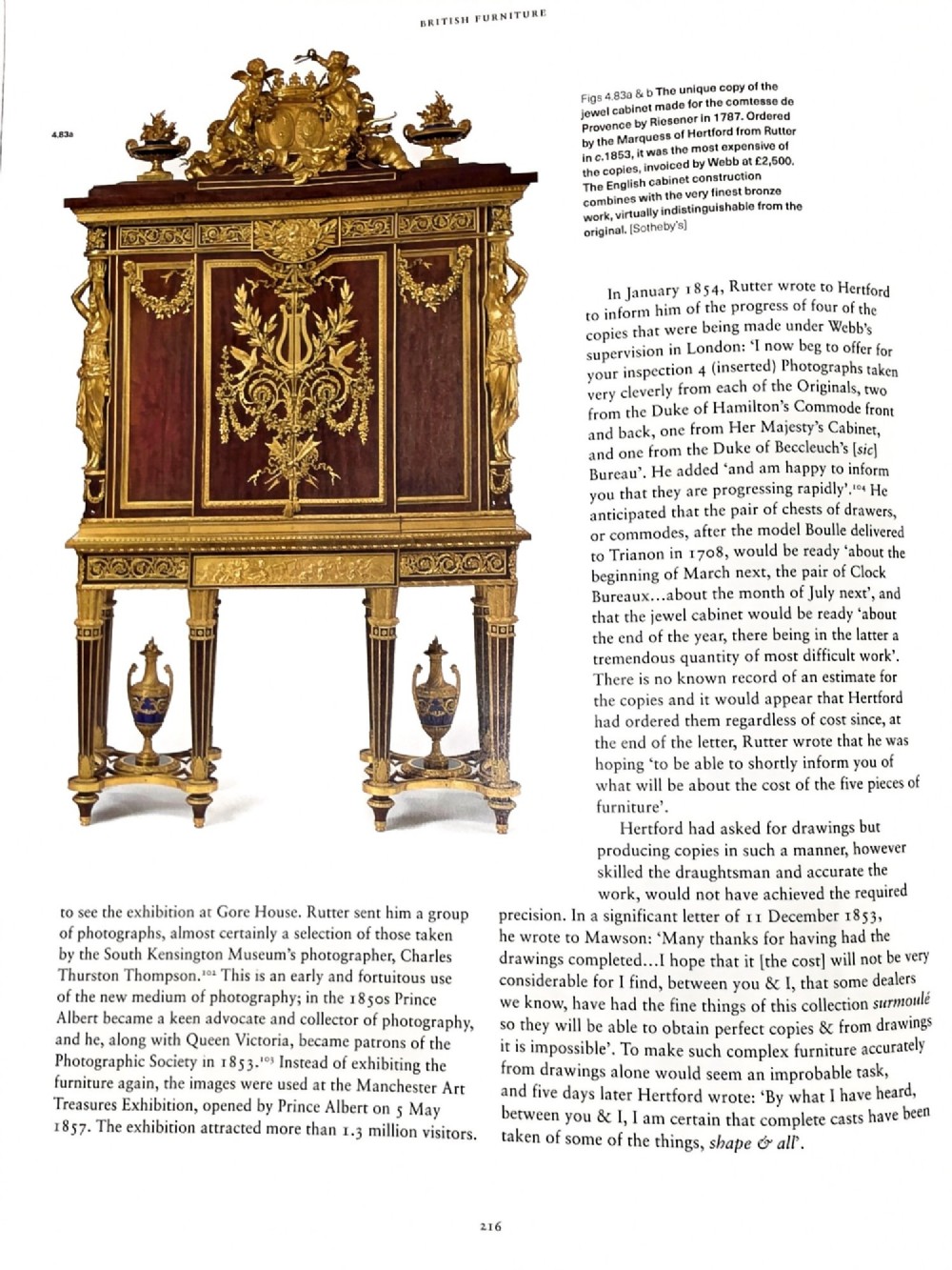 A large veneered display cabinet featuring gilt-bronze mounts, glazed twin doors, glass shelving, and a fabric-lined interior. View XII