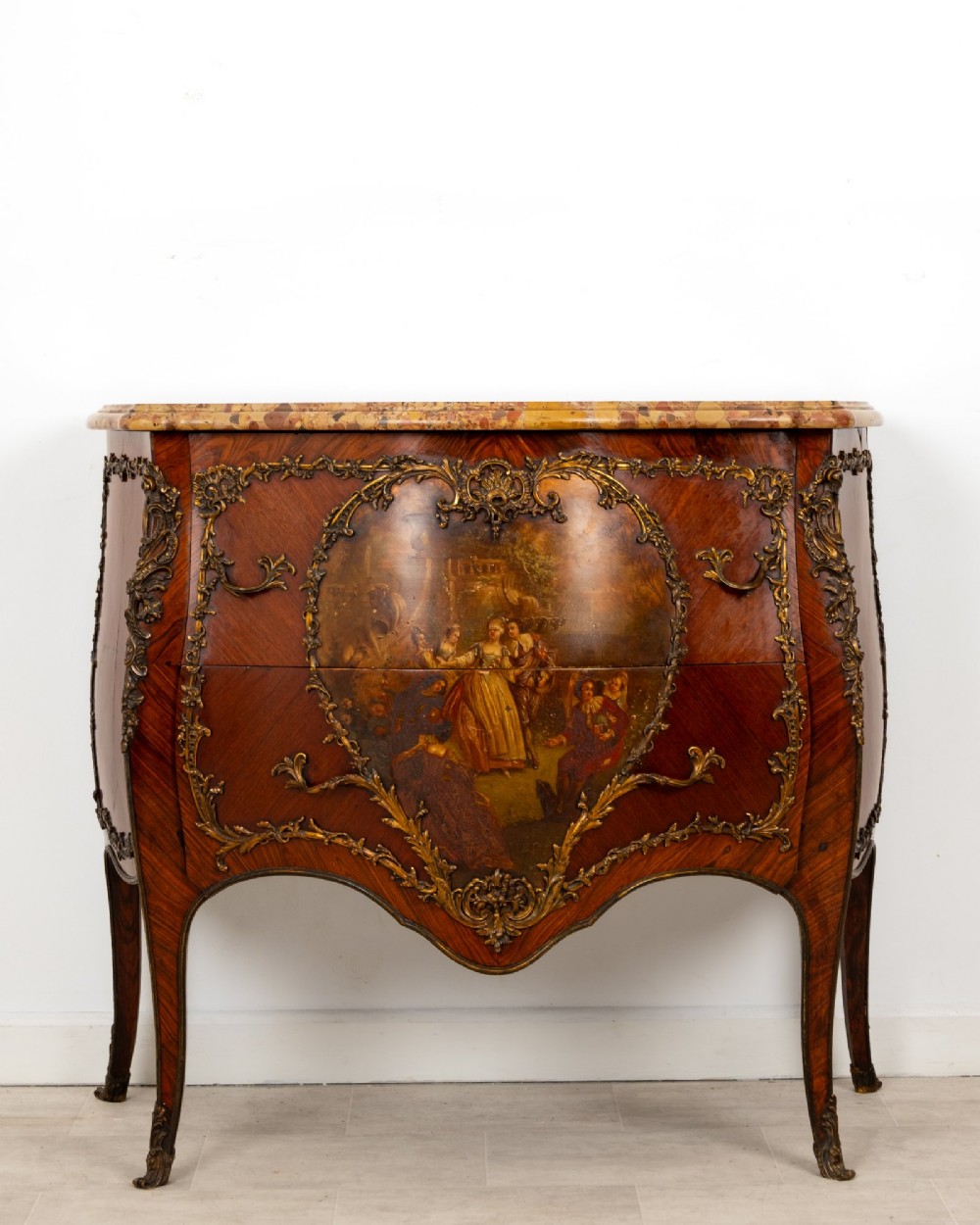 A French Louis XV revival bombee commode in kingwood with gilt-bronze mounts, a central hand-painted Vernis Martin scene, and a marble top. View II