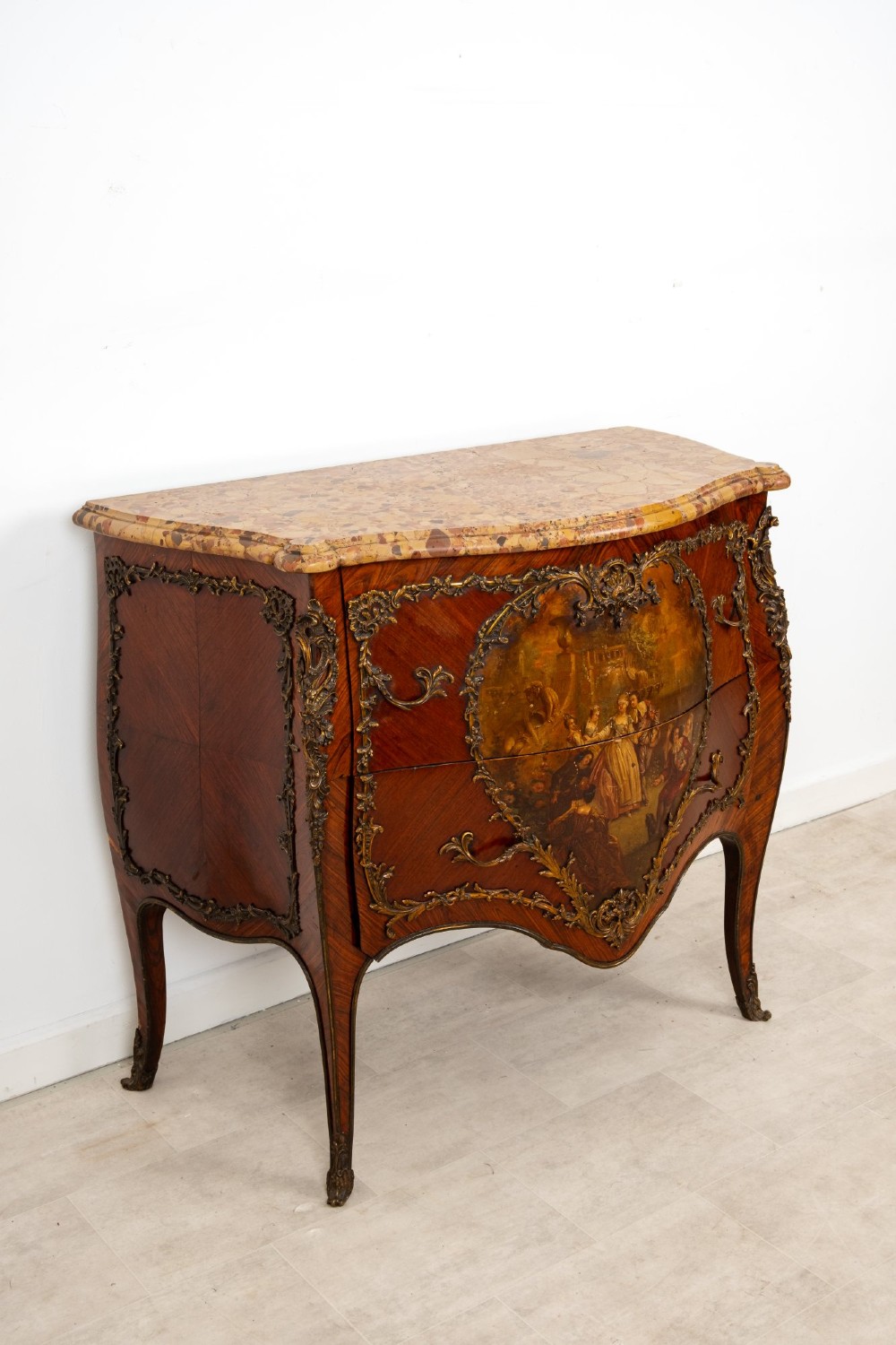 A French Louis XV revival bombee commode in kingwood with gilt-bronze mounts, a central hand-painted Vernis Martin scene, and a marble top. View V