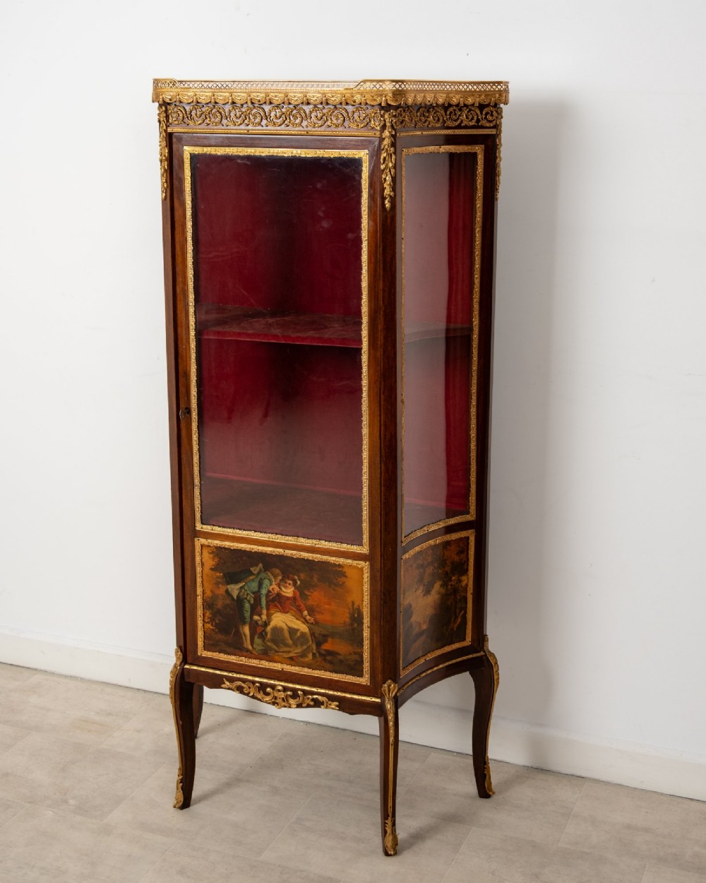 An antique French mahogany vitrine display cabinet featuring hand-painted Vernis Martin panels, gilt bronze mounts, cabriole legs, and a red velvet interior. View III