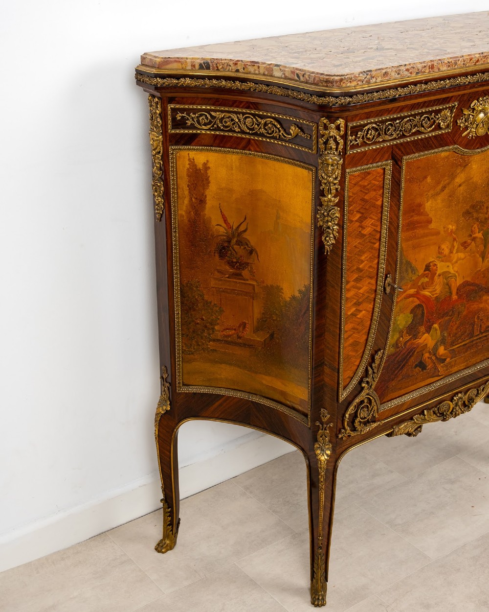 An antique French Louis XV revival side cabinet featuring hand-painted Vernis Martin panels, gilt-bronze mounts, and a shaped marble top. View VIII