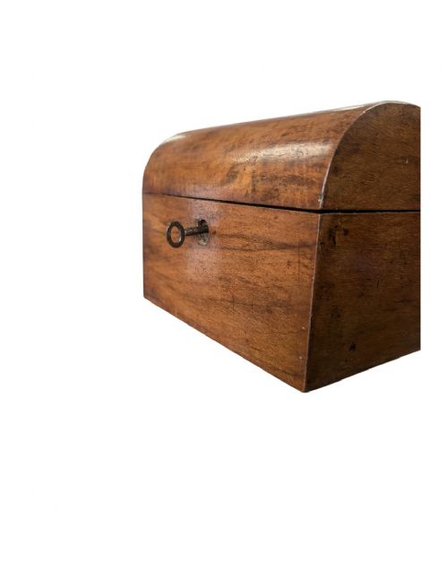 A nineteenth-century dark brown wooden tea caddy featuring a domed lid and a central keyhole. View V