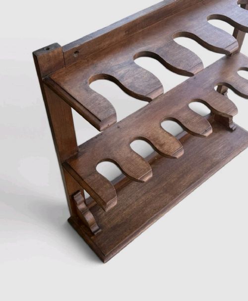 An antique Victorian mahogany boot rack featuring two tiered notched rails designed to hold footwear above a flat rectangular wooden base. View VIII