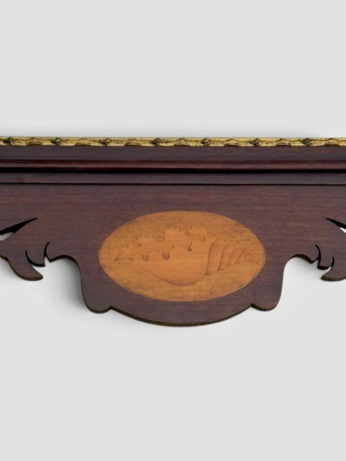 fig 3. A rectangular Georgian style dark mahogany wall mirror featuring a gilded ho-ho bird crest, gilt inner slip border, and a carved shell marquetry medallion at the base.