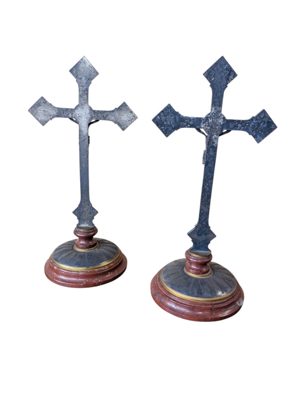 A pair of French Art Nouveau standing altar crucifixes in dark bronze and brass mounted on rounded red marble bases. View II