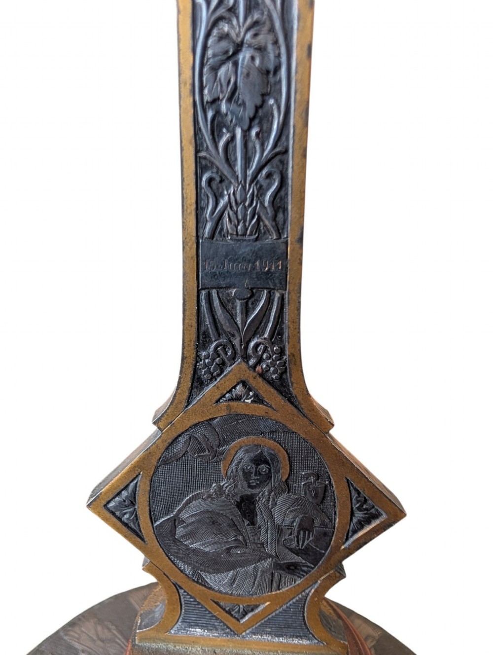 A pair of French Art Nouveau standing altar crucifixes in dark bronze and brass mounted on rounded red marble bases. View IX