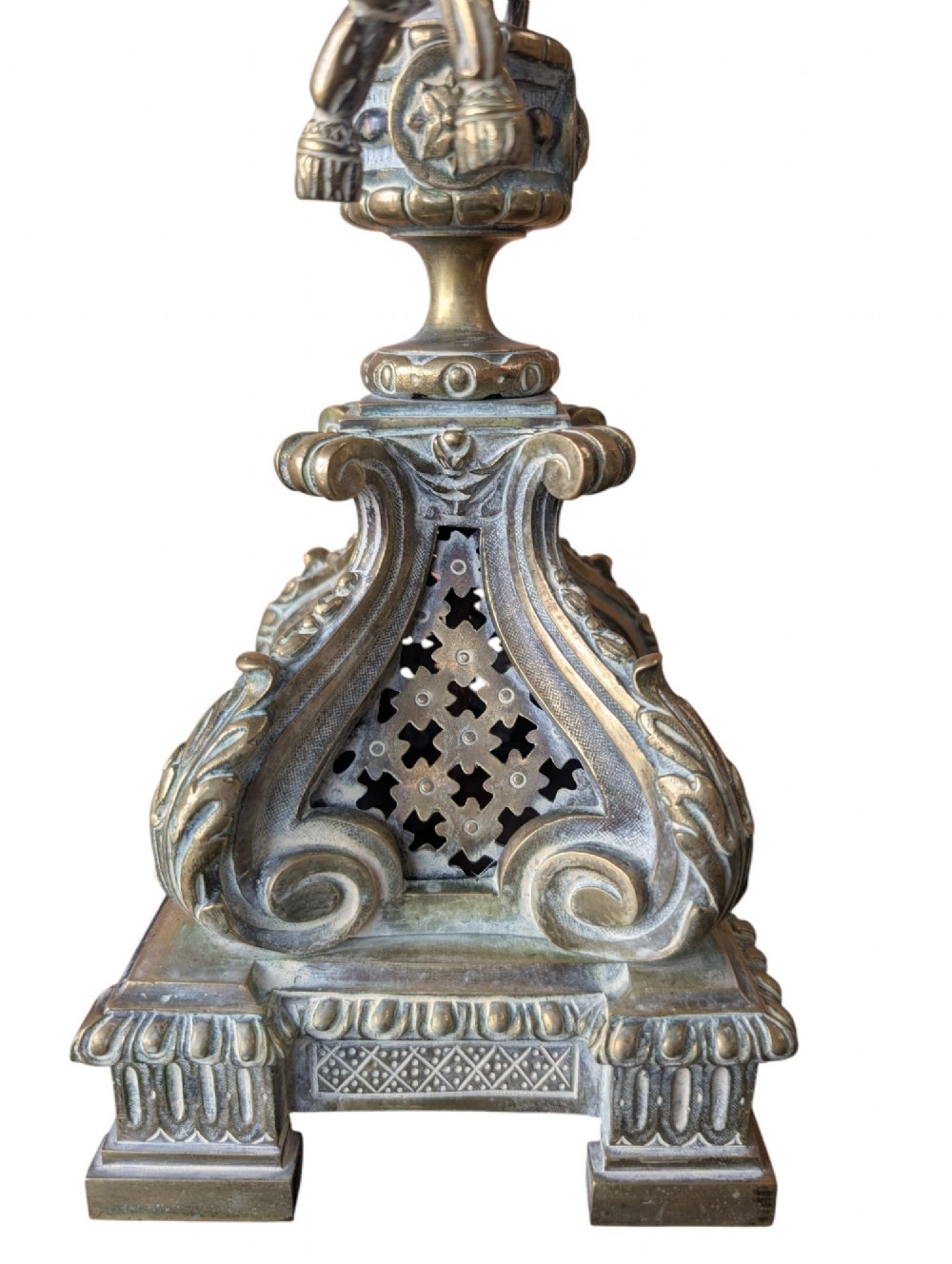 A matching pair of ornate late 19th-century patinated bronze five-light candelabra featuring lion mask motifs, scrollwork arms, and pierced decorative bases. View VI