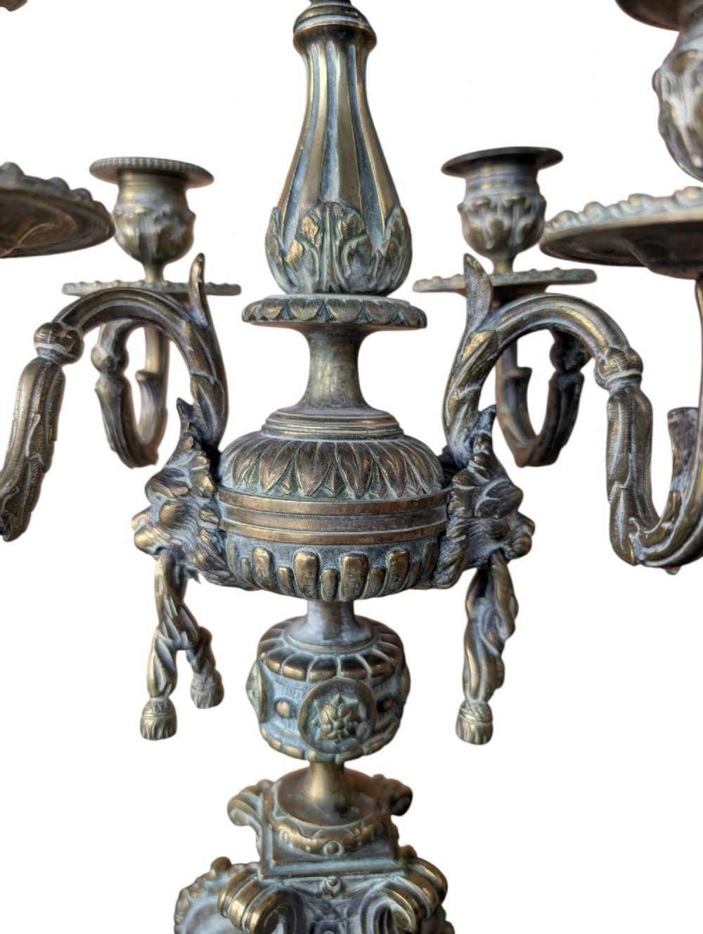 A matching pair of ornate late 19th-century patinated bronze five-light candelabra featuring lion mask motifs, scrollwork arms, and pierced decorative bases. View XI