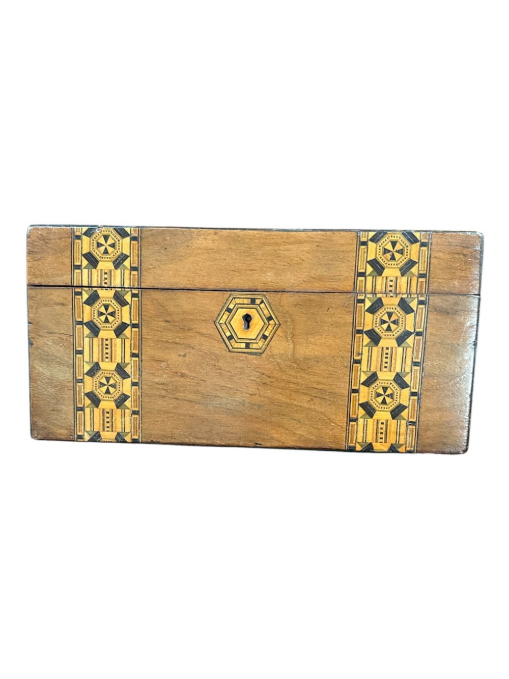An open antique Victorian wooden sewing box featuring geometric Tunbridge ware mosaic inlay and a red ruched silk interior with removable tray compartments. View II