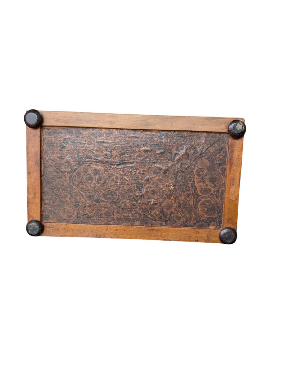 A rectangular Regency period wooden tea caddy featuring dark wood grain, mosaic inlay borders, and a central diamond escutcheon. View V