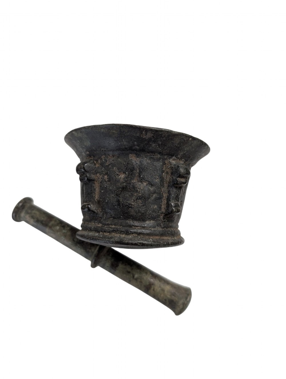 An antique cast bronze mortar and pestle displaying an aged surface patina with a flared rim and turned central ridge. View IV