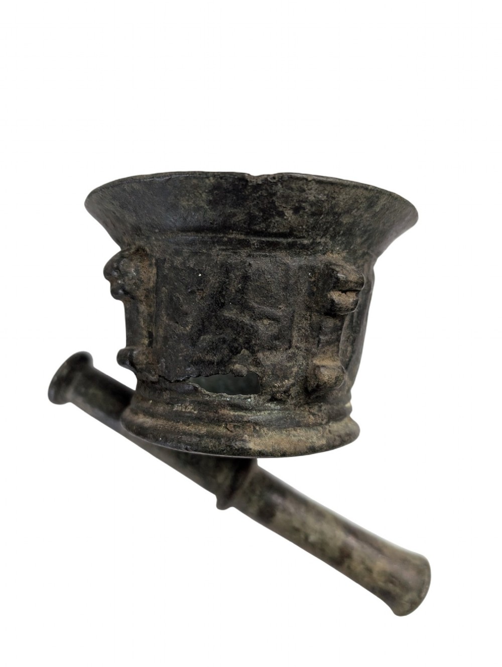 An antique cast bronze mortar and pestle displaying an aged surface patina with a flared rim and turned central ridge. View V