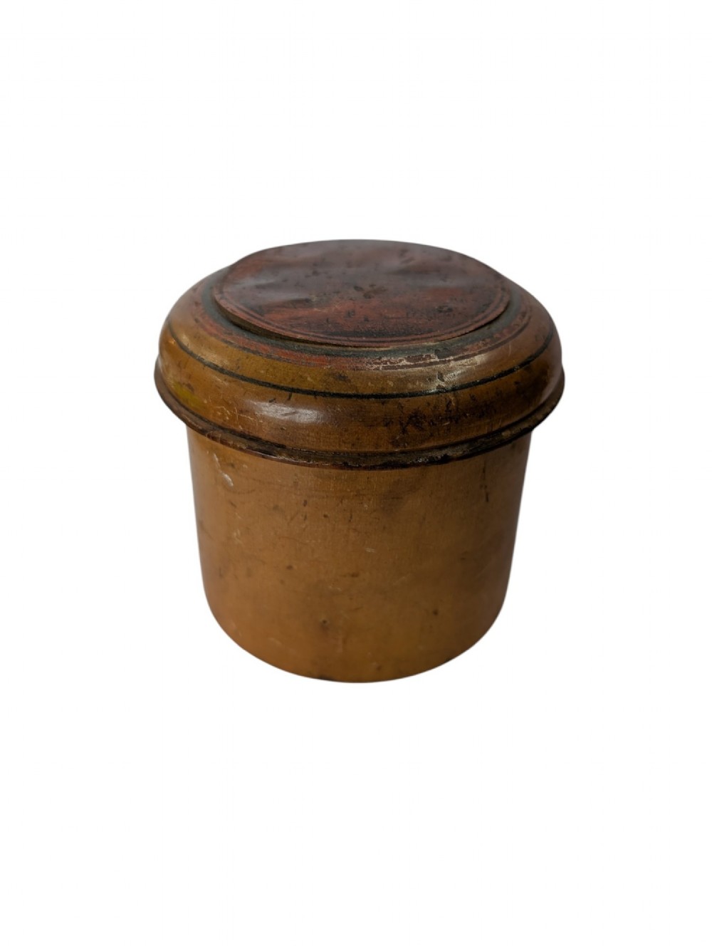 A 19th-century turned boxwood cylindrical container featuring a fitted lid decorated with concentric painted rings and a naturally aged finish.