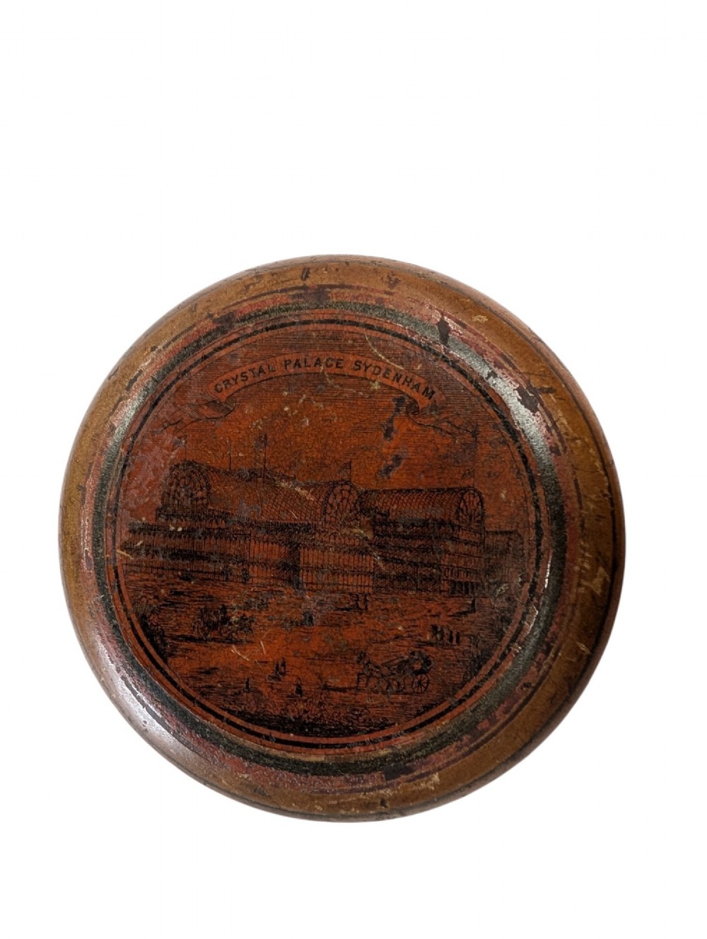 A 19th-century turned boxwood cylindrical container featuring a fitted lid decorated with concentric painted rings and a naturally aged finish. View II