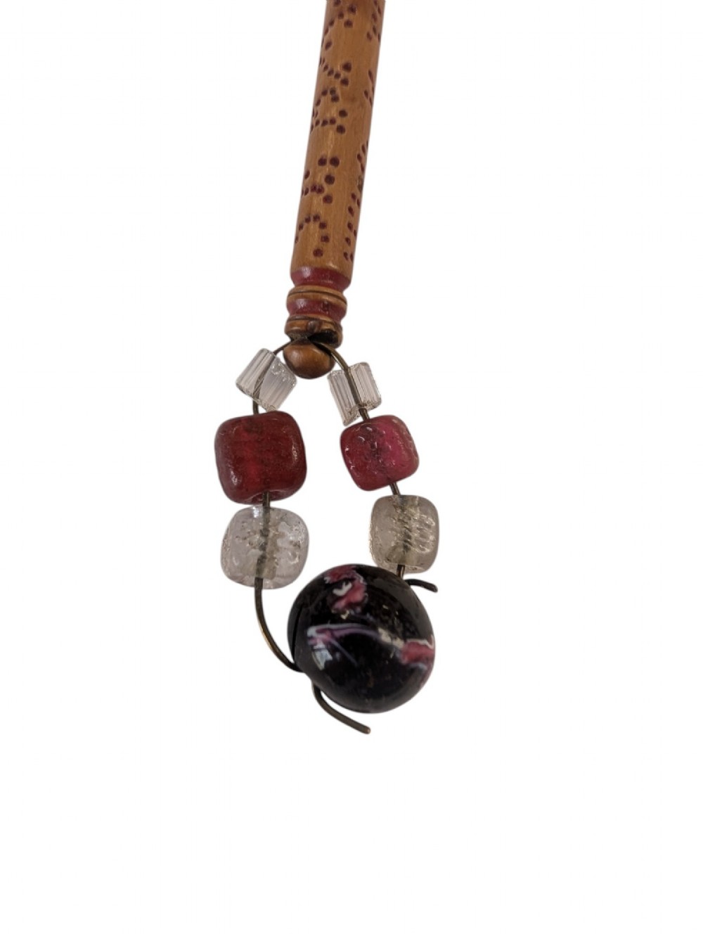 Three turned antique lace bobbins crafted from bone and wood, each featuring decorative wire-bound glass bead spangles. View V