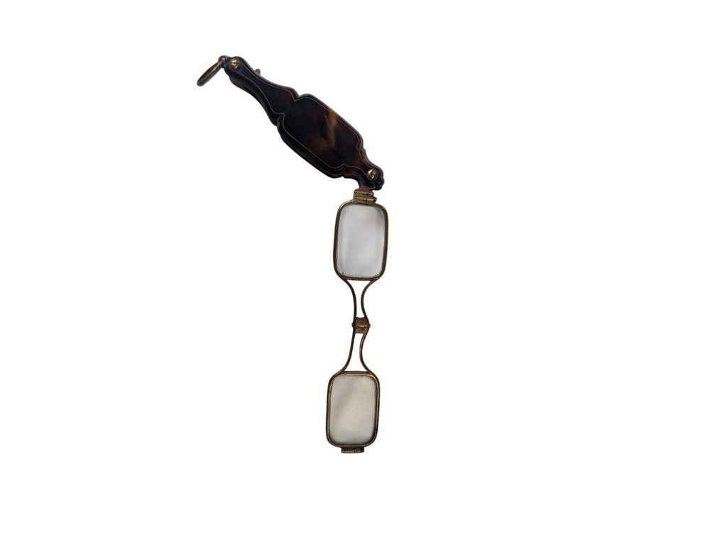 A French antique folding lorgnette with a faux tortoiseshell protective case and brass-framed rectangular lenses extended. View II