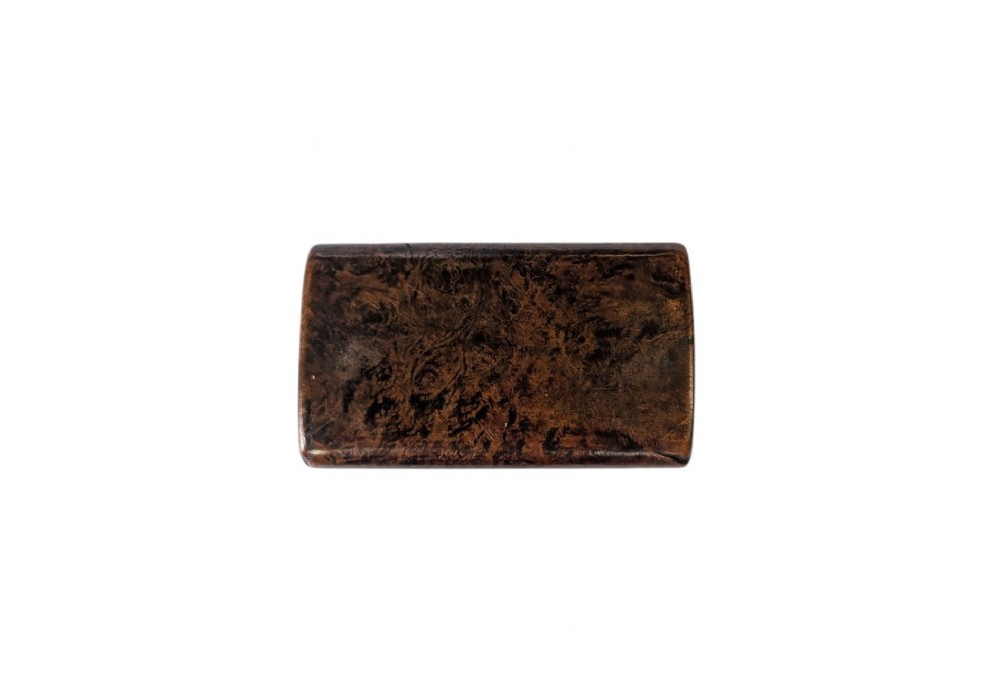 A 19th-century rectangular dark burr wood snuff box with an oval centre inlay and integrated wooden hinges. View II