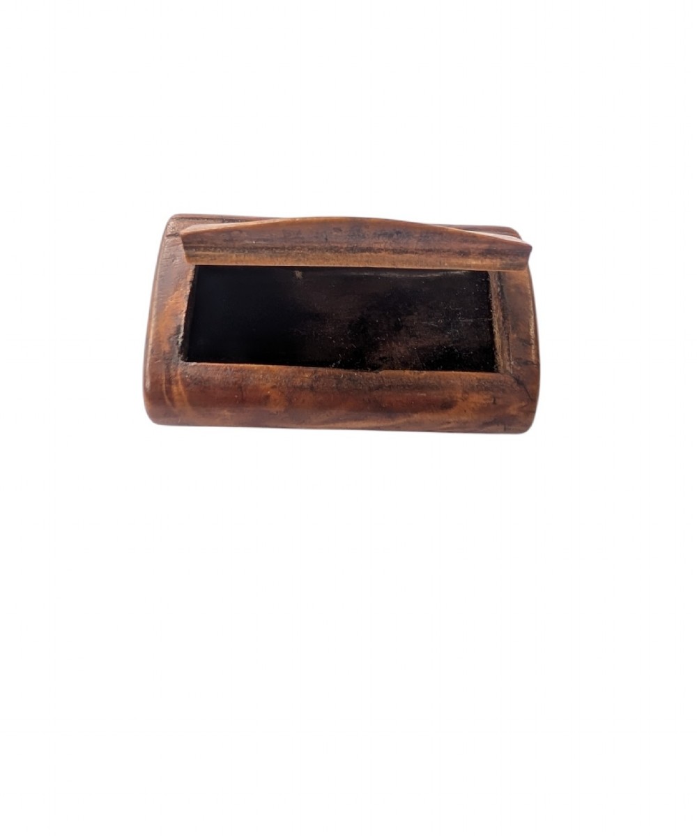 A small rectangular 19th-century carved wooden snuff box featuring an integral wooden hinge and a central oval wood inlay. View III