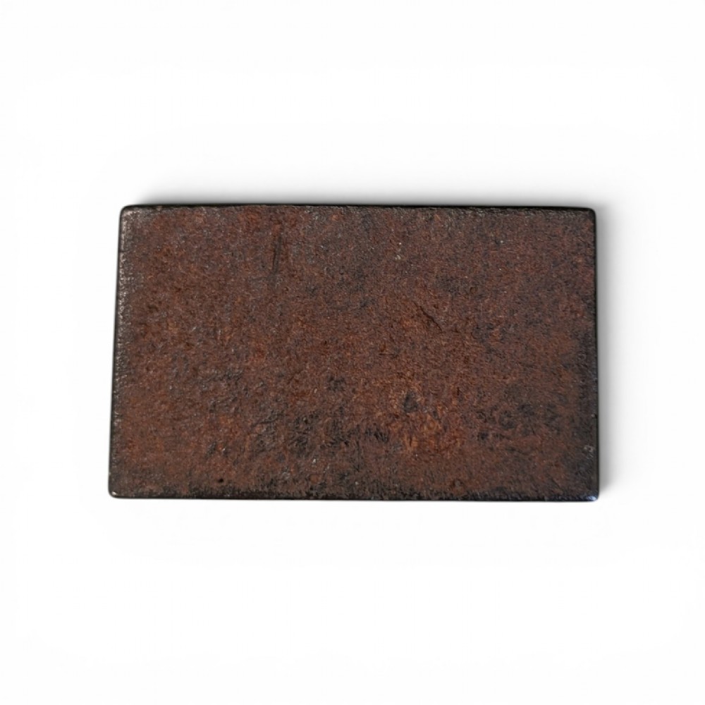 A rectangular 19th-century dark brown rhinoceros hide snuff box featuring an ornate gilt metal central cartouche and matching clasp. View VI