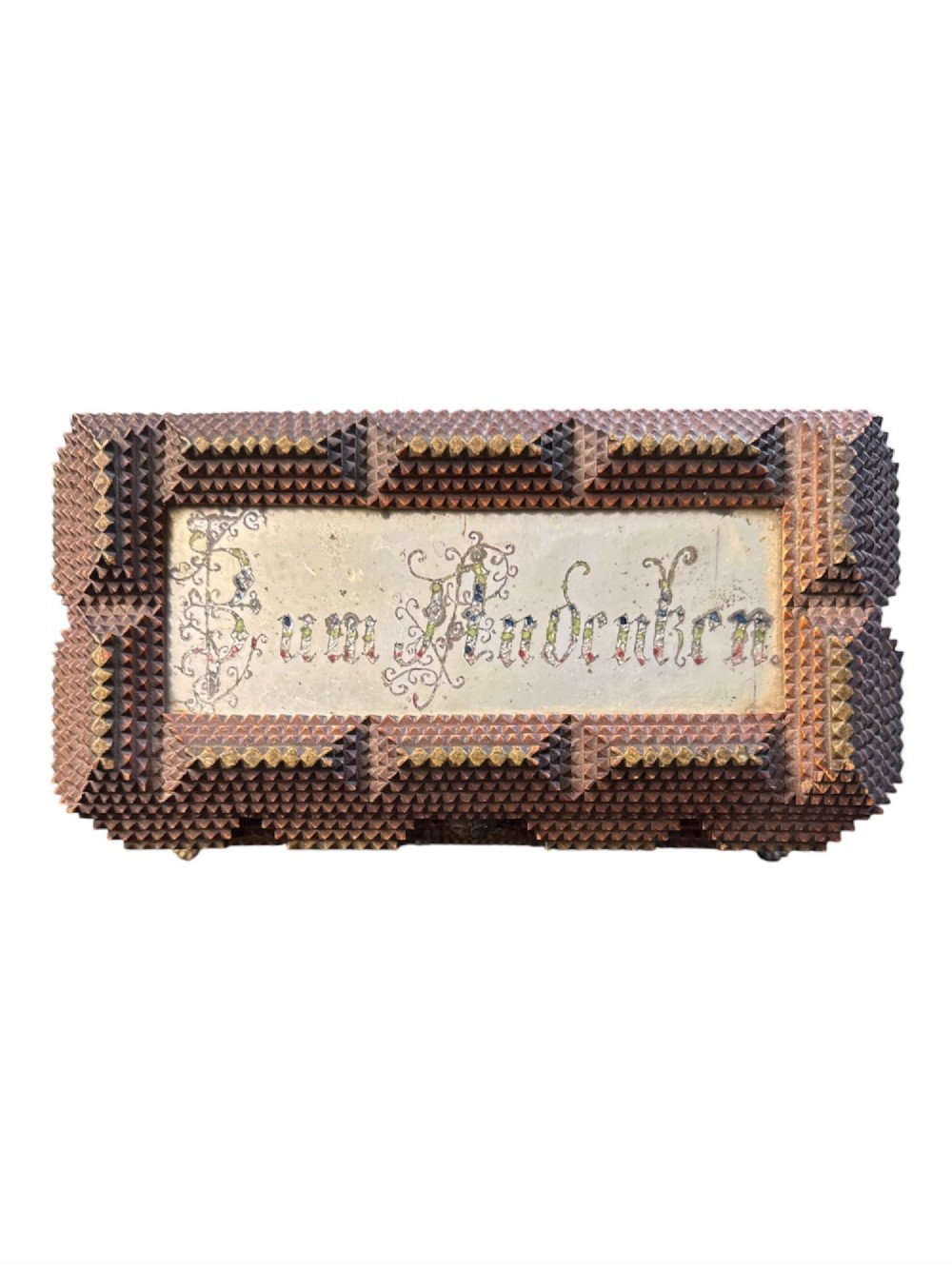 A Victorian tramp art wooden box featuring chip-carved pyramid layers, glass inserts, a metal lion head pull, and small metal feet. View III
