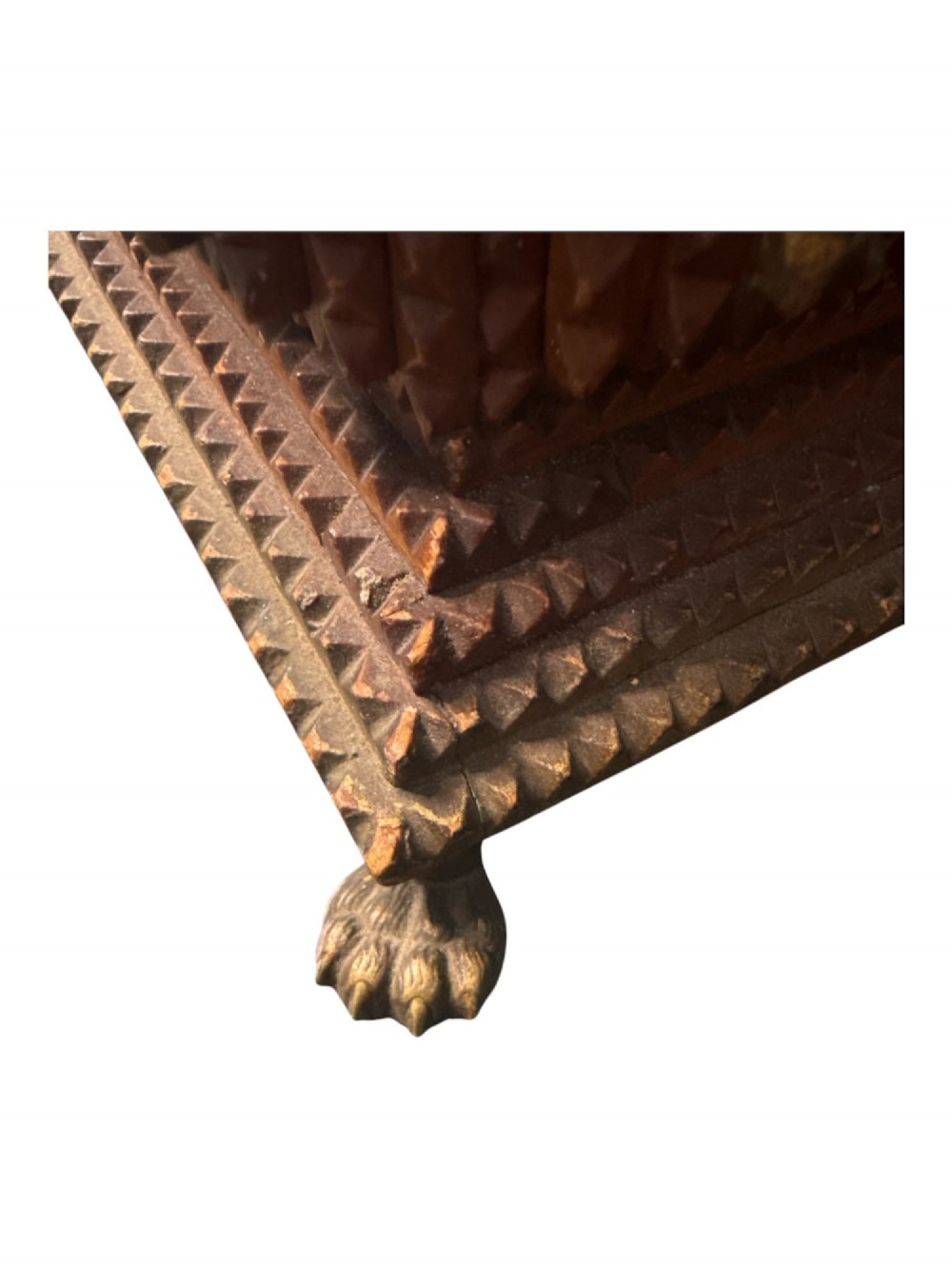 A Victorian tramp art wooden box featuring chip-carved pyramid layers, glass inserts, a metal lion head pull, and small metal feet. View V