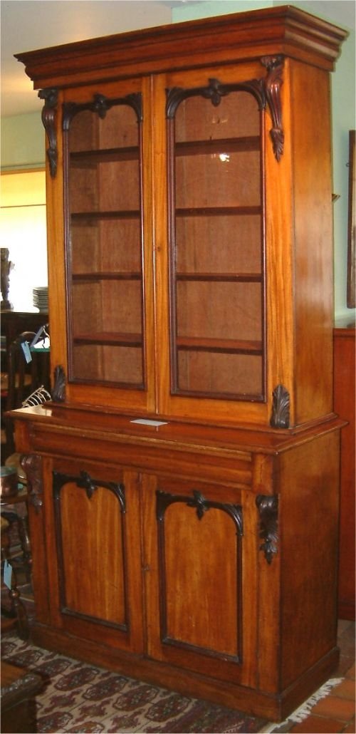 Victorian Walnut Library Bookcase with Darker Contrasting Carved Decoration.