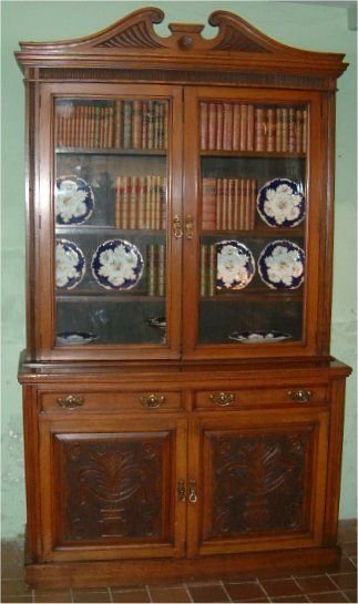 Edwardian Oak Bookcase with Carved Panels & Swan Neck Pediment