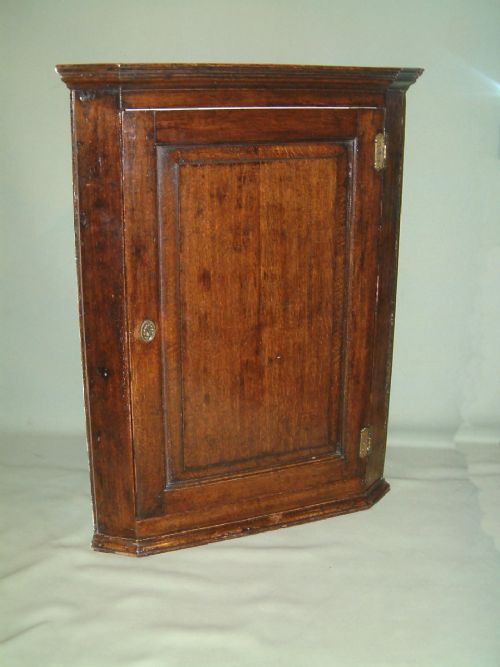 18thc Oak Corner Cabinet with Brass Hinges & Key Escutcheon