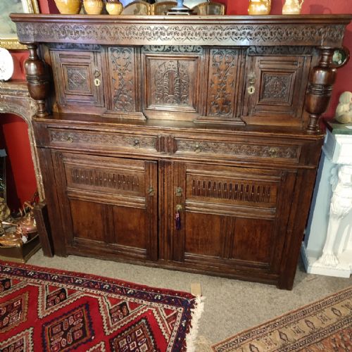 18thc Oak Court Cupboard
with Carved Decoration.