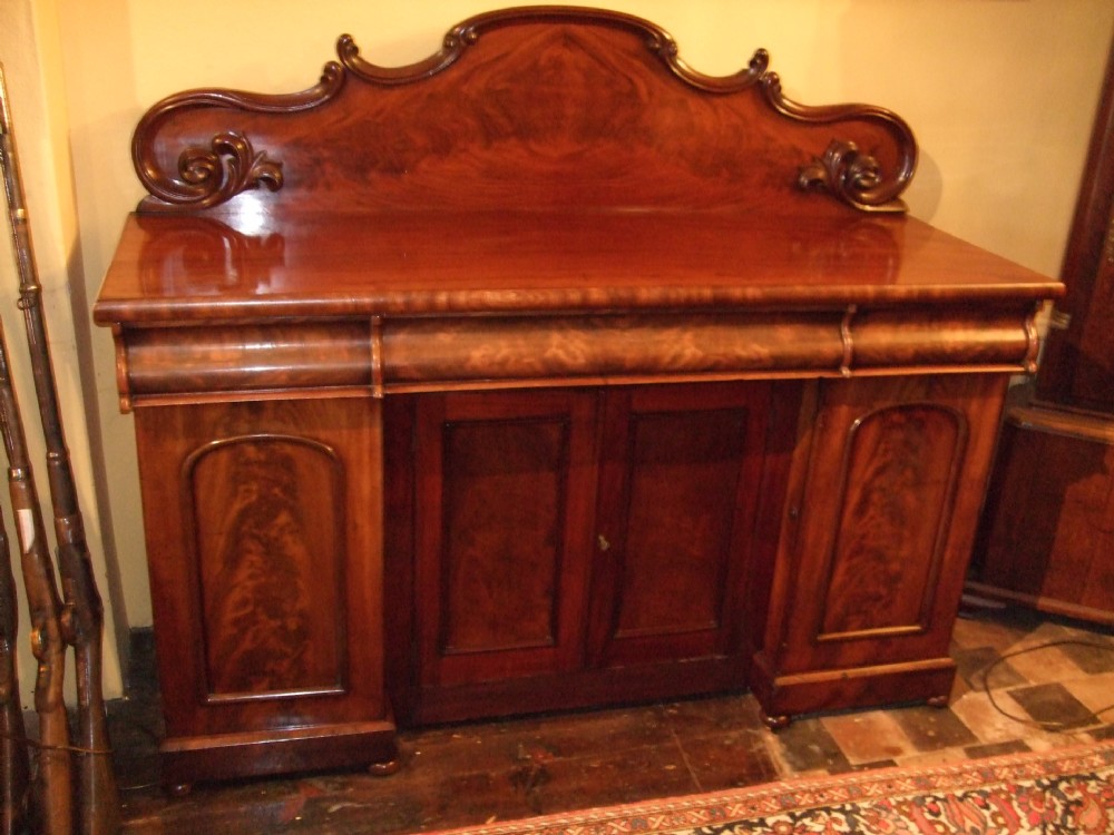 Mid Victorian Flame Mahogany Four Door Sideboard with Cellarette & Slides