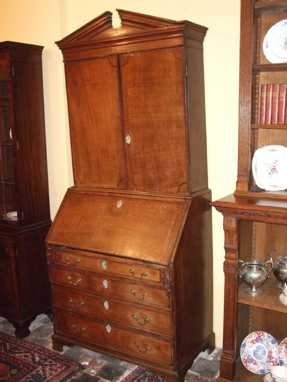 18thC Oak Bureau Bookcase with Crossbanding.With Arched Broken Pediment