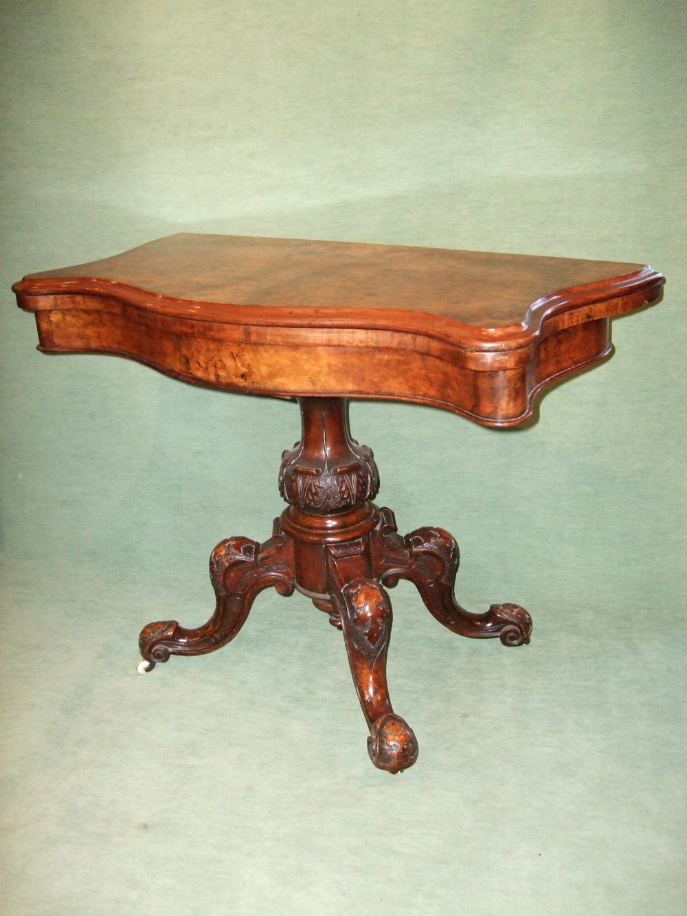 Victorian Burr walnut Fold Over Card Table with Carved Pedestal