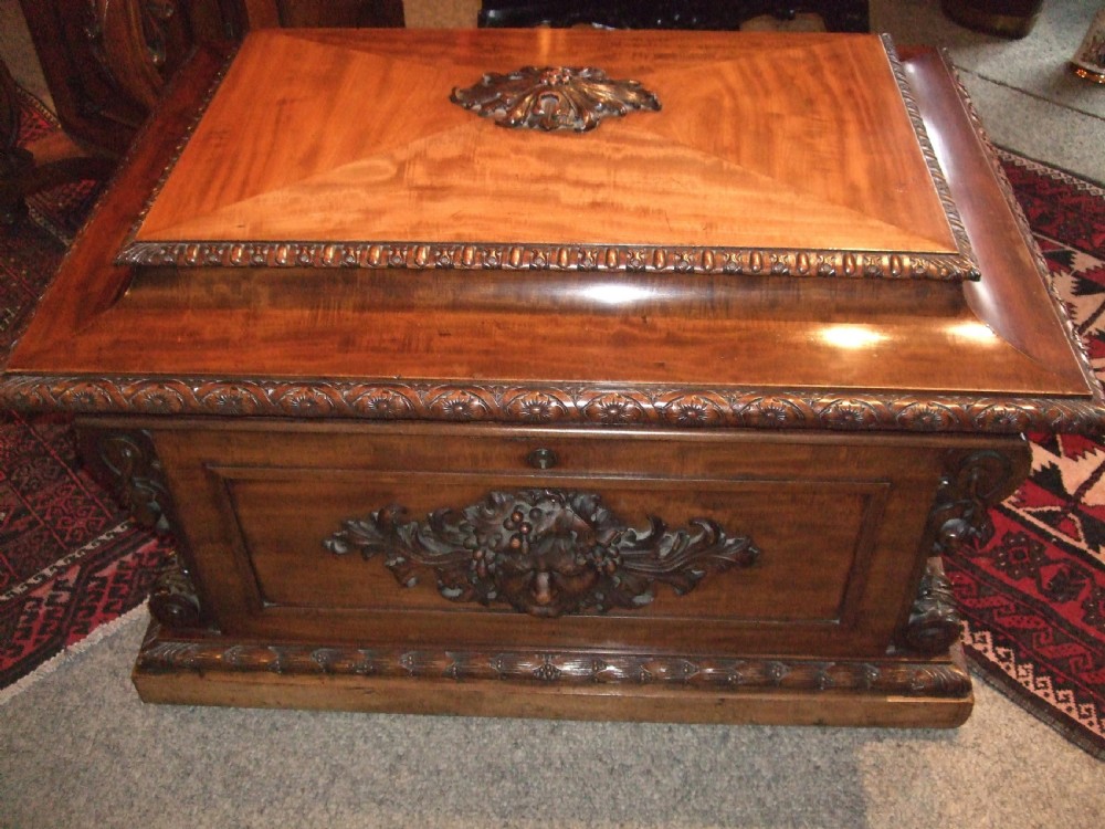 George 3rd Mahogany Cellarette with Carved Bacchanalian Details. 