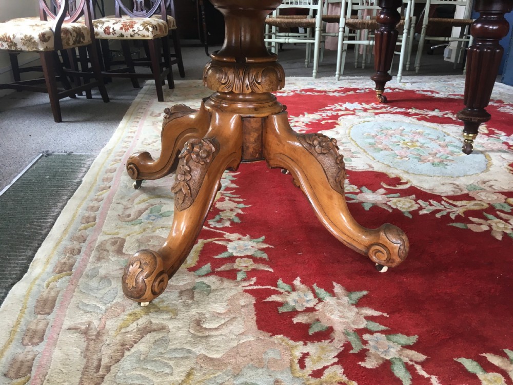 Victorian Burr Walnut Tilt-Top Dining/Centre Table on Carved Pedestal with Floral Decoration. View III